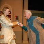 Liz Duvall cast as Phyllida Spotte-Hume and her twin, Countess Glamorgan, and Greg Scherer playing the part of President Harry Percy act out a scene from the upcoming play &ldquo;The Explorer&rsquo;s Club,&rdquo; which will run from today through Nov. 5 at Olympic Theatre Arts. (Erin Hawkins/Olympic Peninsula News Group)