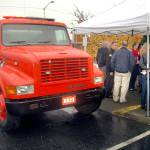 Guests gather outside of the Clallam County Fire District No. 2 office in Port Angeles for the dedication of a new brush truck. (Keith Thorpe/Peninsula Daily News)