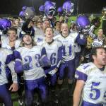 Keith Thorpe/Peninsula Daily News                                Members of the Sequim Wolves football team celebrate after defeating Port Angeles in Friday night&rsquo;s Rainshadow Rumble at Port Angeles Civic Field. Included at the front of the celebration are, from left, Taig Wiker, Gavin Velarde, Ben Newell, Isaiah Cowan and Adam DeFillipo, front. Holding the trophy is Mason Larsen.