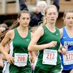 Port Angeles&rsquo; Ella Holland, left and Gracie Long, center, begin their race at the Olympic League Cross-Country Championships on Thursday. The Port Angeles girls won as a team as Holland finished sixth and Long 13th. (Michael Dashiell/Olympic Peninsula News Group)