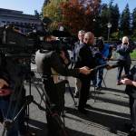 Stephanie McCleary of Chimacum, right, one of the plaintiffs in a lawsuit against the state of Washington regarding the funding of education, talks to reporters Tuesday after she attended arguments in a state Supreme Court hearing in Olympia to determine whether the state has fulfilled its constitutional duty to fully fund basic education. (Ted S. Warren/The Associated Press)