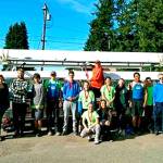 The Olympic Peninsula Rowing Association at American Lake in Lakewood. In front, kneeling, from left, are Lica Kennedy and Lisa Martin. Back row, from left, are Veronica Kennedy, Maria England, Jake McGovern, Skittles Pavlak, Tyler Turner, Harrison Fulton, Shannon Callahan, Jack Feingold, Ella Ventura, Emily Sirguy, Nathan Mishler, Aiden Feingold, Daniel Weaver and Calum Swinford.
