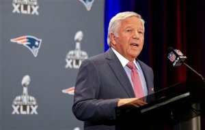 New England Patriots owner Robert Kraft reads a statement during a news conference Monday in Chandler