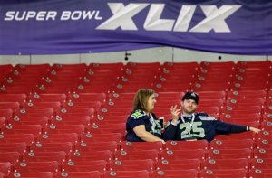 Seattle Seahawks fans sit in the stands after the NFL Super Bowl XLIX football game between the Seattle Seahawks and the New England Patriots in Glendale
