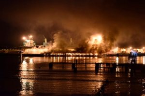 A significant amount of dark and smelly smoke from a fire at a deepwater port terminal billows over the town of Squamish