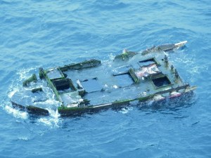 The remains of what was likely a commercial fishing boat were spotted floating off the Oregon coast last week. (The Associated Press)