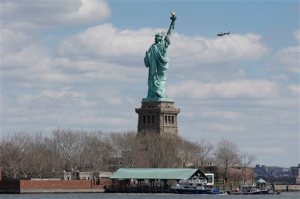 New York police boats are docked at Liberty Island when the Statue of Liberty was evacuated (The Associated Press)