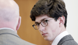 Owen Labrie in court while sitting next to his attorney Jay Carney. The Associated Press