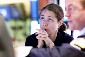 Amanda Anderson pauses while working on the floor of the New York Stock Exchange on Tuesday. The Associated Press