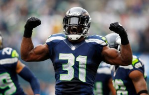 Seahawks safety Kam Chancellor ended his holdout and reported to the team Wednesday. John Froschauer/The Associated Press