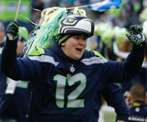 To inspire you — Seattle Seahawks fan on the field as a part of a "12th man" salute before the Dec. 28 game with the St. Louis Rams in Seattle (The Associated Press)