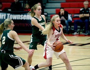 Port Townsend's Kaitlyn Meek drives past Vashon's Olivia Larson