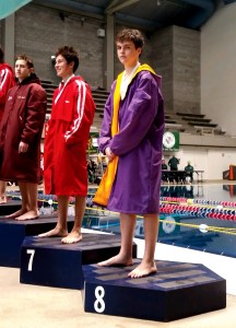 Sequim sophomore Matthew Craig stands on the podium after placing eighth in the 1-meter dive at the Class 2A state championships. (Susan Craig)