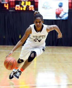 Peninsula point guard Imani Smith dribbles upcourt during the Pirates' 69-55 win in the NWAC tournament quarterfinals. Smith led Peninsula with 20 points. (Rick Ross/Peninsula College)