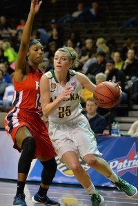 Alaska-Anchorage's Jessica Madison (25) drives against Francis Marion's Khayani Chandler during the Seawolves' 79-55 win over the Patriots in the NCAA Division II Elite Eight. Madison is a 2011 graduate of Port Angeles High School. (Sam Wasson/University of Alaska-Anchorage Athletics)