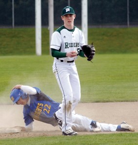 Port Angeles second baseman Noah McGoff stands after tagging out Bremerton's Mikhail Papilon on a steal attempt. (Keith Thorpe/Peninsula Daily News)