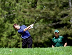 Chimacum's Chris Bainbridge hits a tee shot during the Port Ludlow Invitational at Port Ludlow Golf Course. Bainbridge finished tied for seventh. (Steve Mullensky/for Peninsula Daily News)