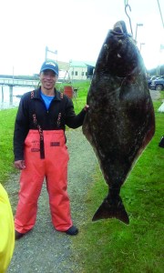 Seattle-area angler David Lewis caught this 126-pound halibut at the Garbage Dump hole off Neah Bay. (Big Salmon Resort)