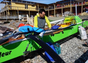 Matt Johnson of Seattle prepares his one-man pedaled trimaran for the Race to Alaska