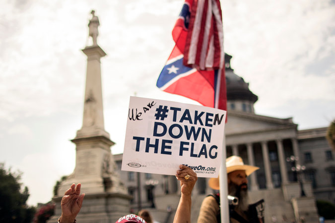 A sign held by Maria Calef of Columbia