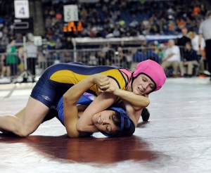 Forks' Brooke Peterson pins Elsa Gonzales of Kona Benton in the 145-pound girls wrestling semifinals at Mat Classic XXVII