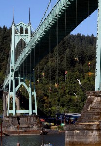Activists hang from the St. Johns Bridge in Portland