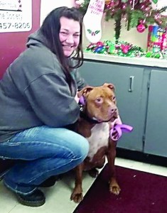 Jessica Peterson poses with Lady after she adopted her from the Olympic Peninsula Humane Society before Christmas.  Olympic Peninsula Humane Society ()