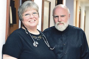 Nurse practitioners Deborah Wheeler and David Kanters see some 20 patients a day at CliniCare in Port Angeles. (Diane Urbani de la Paz/Peninsula Daily News)