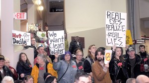 Fluoride opponents fill the hallway and stairs outside the City Council chambers at Port Angeles City Hall on Tuesday night. (Keith Thorpe/Peninsula Daily News)