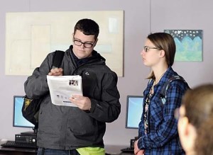 Sequim High students Taylor Bullock and Emily Webb present information about the Sequim School Districts $54 million construction bond proposal to classmates in early January.  Michael Dashiell/Olympic Peninsula News Group ()