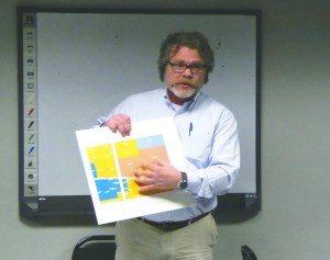 Jefferson County Associate Planner Joel Peterson presents information about the updated sign code to the county commissioners Monday.  Charlie Bermant/Peninsula Daily News ()