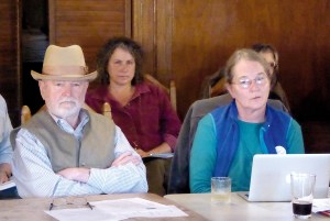 Jefferson Healthcare Commissioner Chuck Russell and citizen Debbie Jahnke listen to a presentation at a meeting Thursday where abortion services at the hospital in Port Townsend were discussed. Photo by Charlie Bermant/Peninsula Daily News ()