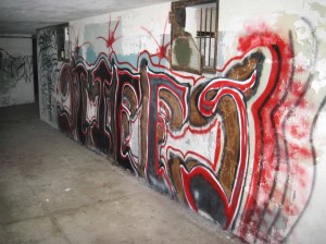 One of the fresh graffiti that cover walls of one of Fort wordens historical bunkers is shown in this Port Townsend Police Department photo. ()