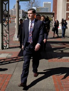 Washington state Auditor Troy Kelley leaves the Federal Courthouse in Tacoma last Thursday after pleading not guilty to a federal grand jury indictment on charges of filing false tax returns
