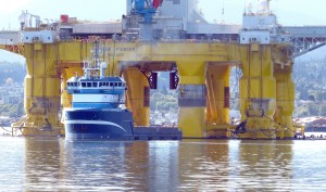 The blue offshore-supply vessel Harvey Supporter services the Polar Pioneer in Port Angeles Harbor. [Click on arrow upper right to see other vessels discussed in this column.] (David G. Sellars/for Peninsula Daily News)