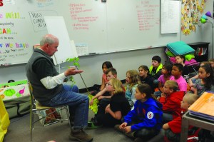 Master Gardener Bill Wood of Port Angeles talks plant life with a second-grade class Wednesday at Forks Elementary School.  Lonnie Archibald/for Peninsula Daily News ()