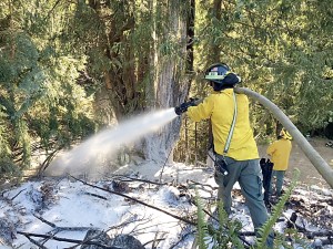 Clallam County Fire District No. 2 responds to a controlled burn that became out of control and was spreading into the brush and trees near Port Angeles.  Clallam County Fire District No. 2 ()
