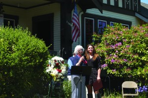 Betsy Reed Schultz speaks to the audience at the Captain Joseph House Memorial Service in Port Angeles on Sunday. She is joined by fellow speaker Sarah Vargo. — Rob Ollikainen/Peninsula Daily News ()