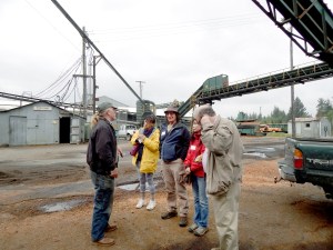 Joe Seymour speaks to a group of tourists at Allen Logging Co. near Forks during a Forks Chamber of Commerce Logging & Mill tour.  Christi Baron/Forks Forum ()