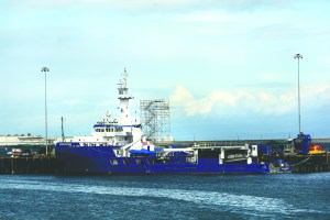 A ship is docked at Port of Port Angeles Terminal 3 on Monday. The port will advertise for bids on stormwater conveyance improvements for the terminal estimated to cost between $1.3 million and $1.6 million. (Jesse Major/Penninsula Daily News)