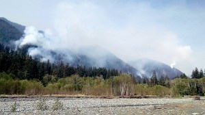 Smoke rises from the Paradise Fire in Olympic National Parks Queets River watershed late Monday afternoon. U.S. Forest Service photo