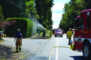 State Highway 20 was blocked for about 50 minutes Thursday afternoon while firefighters from East Jefferson Fire-Rescue and Port Ludlow Fire & Rescue fought five small brush fires by the side of the road.  Bill Beezley/East Jefferson Fire-Rescue