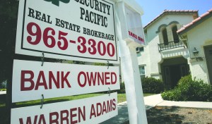 A bank-owned home is seen for sale in Sacramento