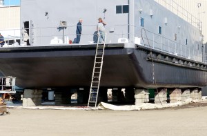 The Navy barge YFN 1217 is shown on the hard at Platypus Marine Inc. in Port Angeles before she was put back in the water last week. —Photo by David G. Sellars/for Peninsula Daily News
