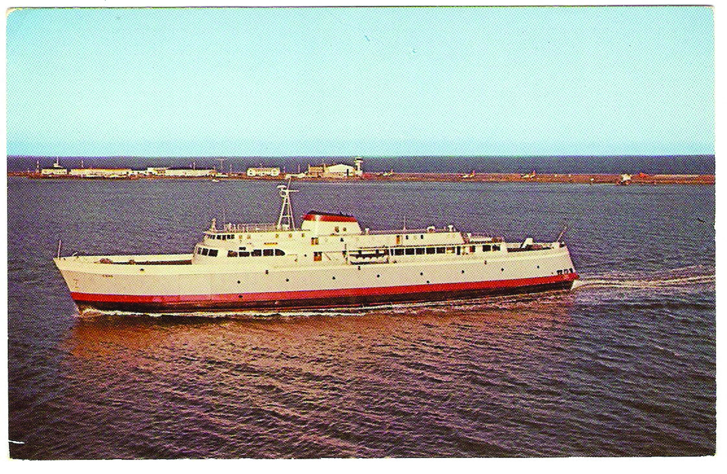 The MV Coho sails into Port Angeles Harbor in the early 1960s.  Black Ball Ferry Line