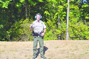 Clallam County Sheriff's Deputy Josh Ley demonstrates how to use a Project Lifesaver receiver designed to pick up signals from small transmitters worn by clients with cognitive disabilities. Clallam County Sheriff's Office