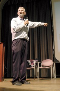 State Superintendent Randy Dorn points to a list of 10 steps to be successful educators Wednesday morning while speaking to about 200 Sequim School District staff members in the Sequim High School auditorium as part of the districts employee back-to-school day.  Chris McDaniel/Peninsula Daily News