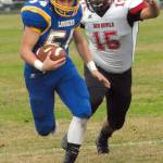 Crescent&rsquo;s Noah Leonard is pursued by Neah Bay&rsquo;s Joseph Yallup in a game played on Sept. 30 in Joyce.                                Keith Thorpe/Peninsula Daily News