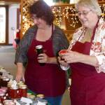 The Christmas Bizarre season is upon us now. Seven organizations have their bizarres this first weekend in November. Pictured here is preparation for the bizarre at the First Baptist Church in 2016. Kim Luker (l) and Robin Sweeney look over the many jars of handmade jams and jellies especially made for the public sale. dlogan