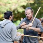 Alex Tienda of Sequim, left, and Michael Lazzari of Sequim run through an Eskrima drill at Tribal Edge. (Jesse Major/Peninsula Daily News)
